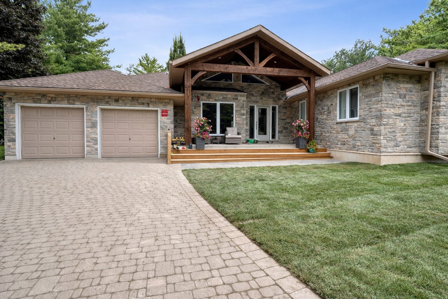 Completed beige two-storey home addition, after photo